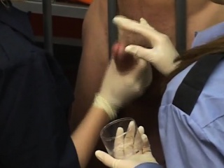 Blonde And Brunette Prison Guards Jacking Off A Naked Handcuffed Guy