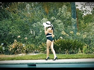 Linda Enjoys Herself By The Pool