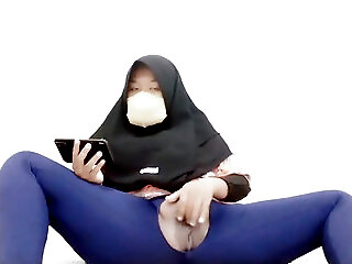 Indonesian Hijab Aunt Wearing Cucumber